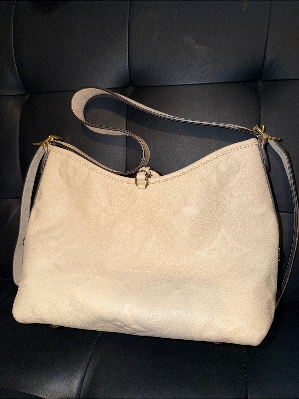 Louis Vuitton Cream Embossed Monogram carry all Bag with Gold Hardware